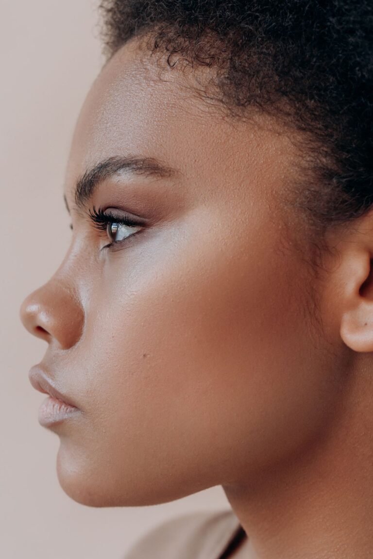 Close-up profile portrait of a woman with natural features